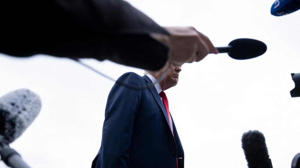 Photo of microphones pointed at Trump