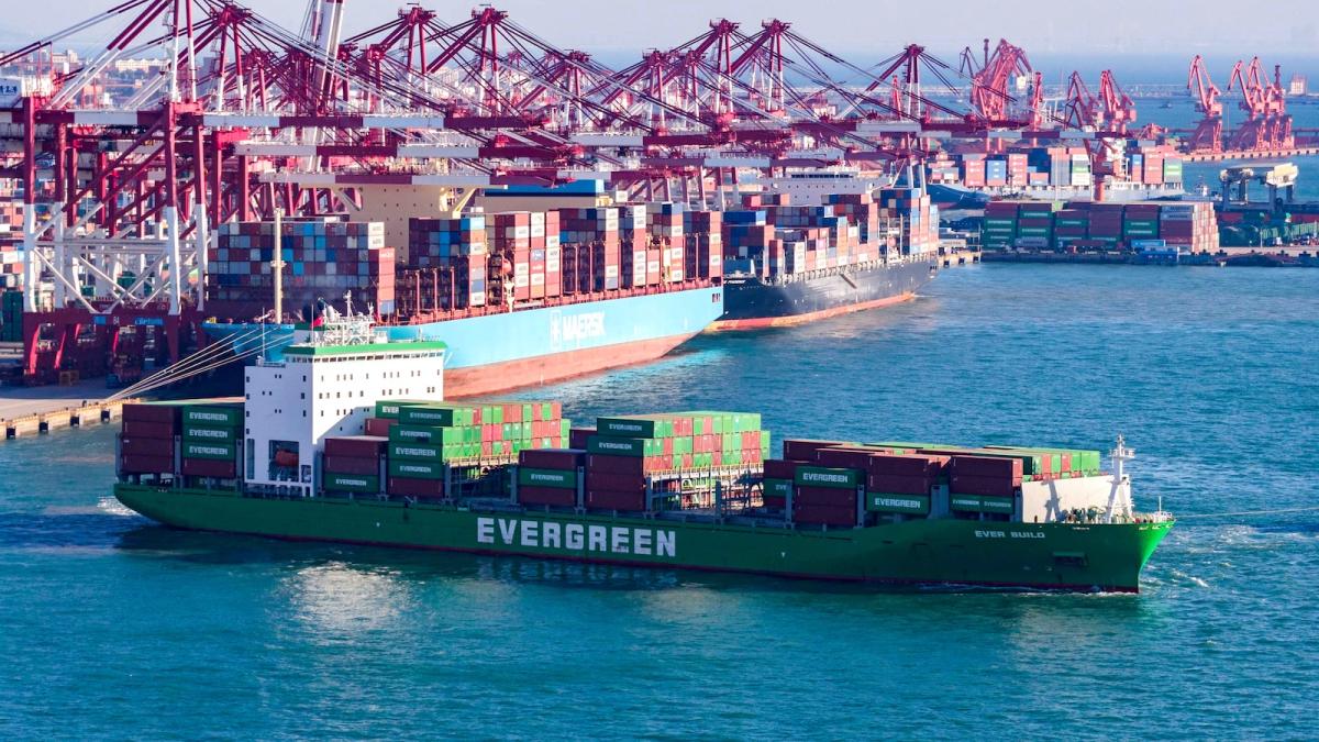 Ship docks at barge