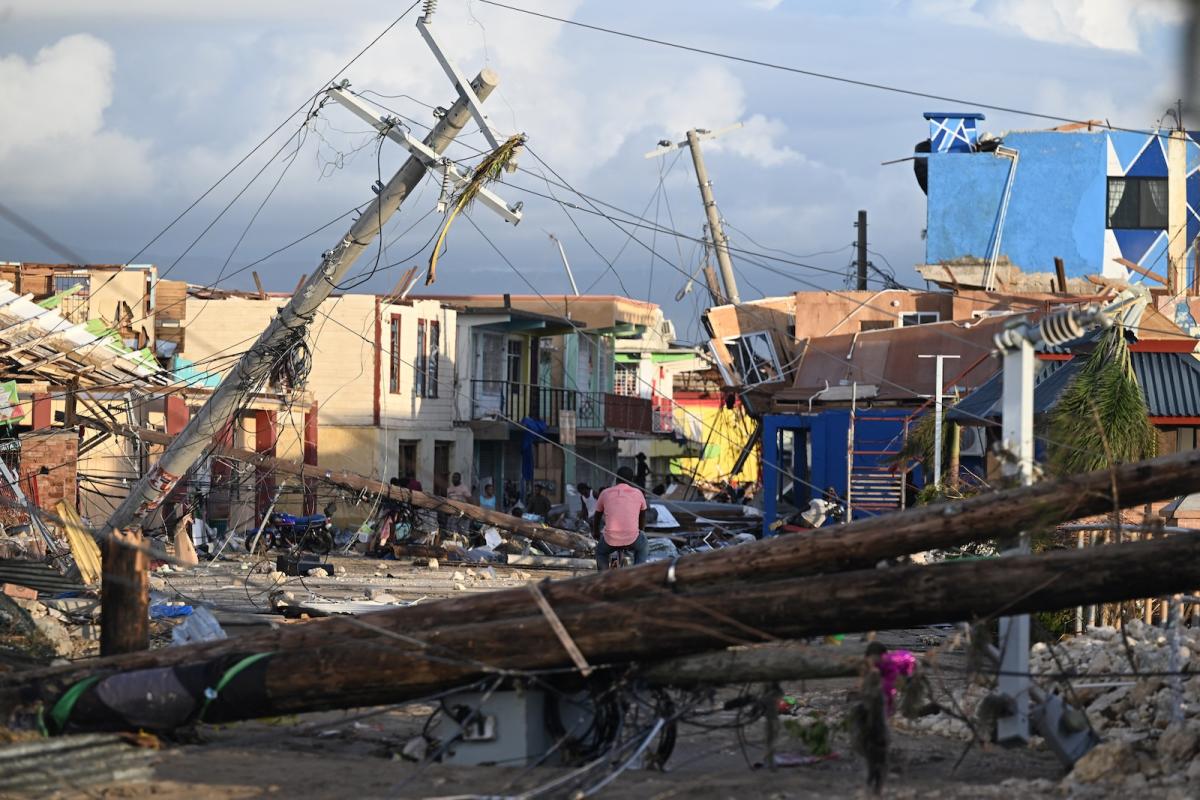 A photo shows downed power lines and wrecked buildings in Jamaica following Hurricane Melissa.