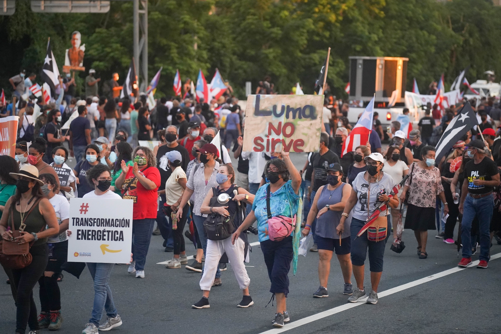 Protesters march during a demonstration against LUMA Energy in what organizers called All of Puerto Rico Against LUMA on October 15, 2021, in San Juan, Puerto Rico.