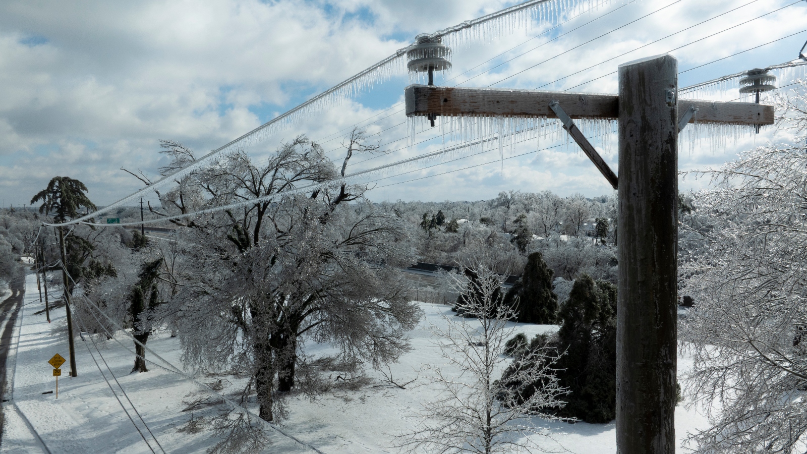 Ice accumulates on utility lines in Nashville, Tennessee, during Winter Storm Fern. The storm knocked out power to at least 300,000 people across the South.
