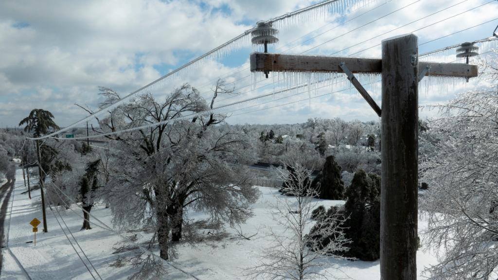 Ice accumulates on utility lines in Nashville, Tennessee, during Winter Storm Fern. The storm knocked out power to at least 300,000 people across the South.
