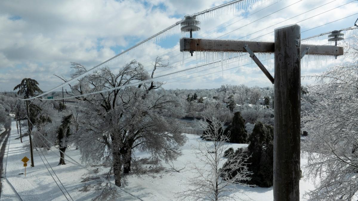 Ice accumulates on utility lines in Nashville, Tennessee, during Winter Storm Fern. The storm knocked out power to at least 300,000 people across the South.