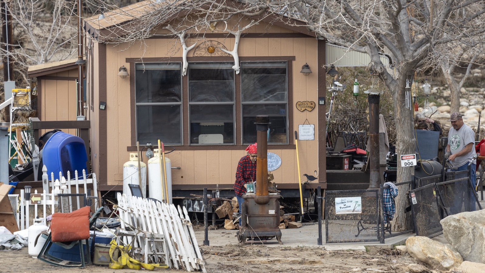 Mobile home with person walking by