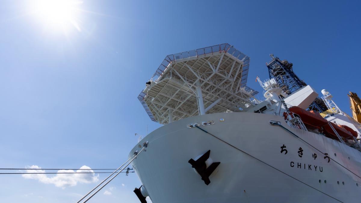 The research ship Chikyu, operated by the Japan Agency for Marine-Earth Science and Technology, is shown berthed in Shimizu, Japan.