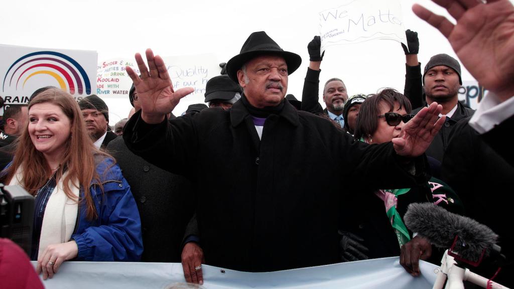 Rev. Jesse Jackson walks in a national mile-long march to highlight the push for clean water in Flint.