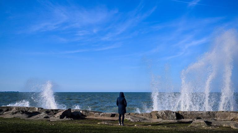 Waves crash on the shore of Chicago