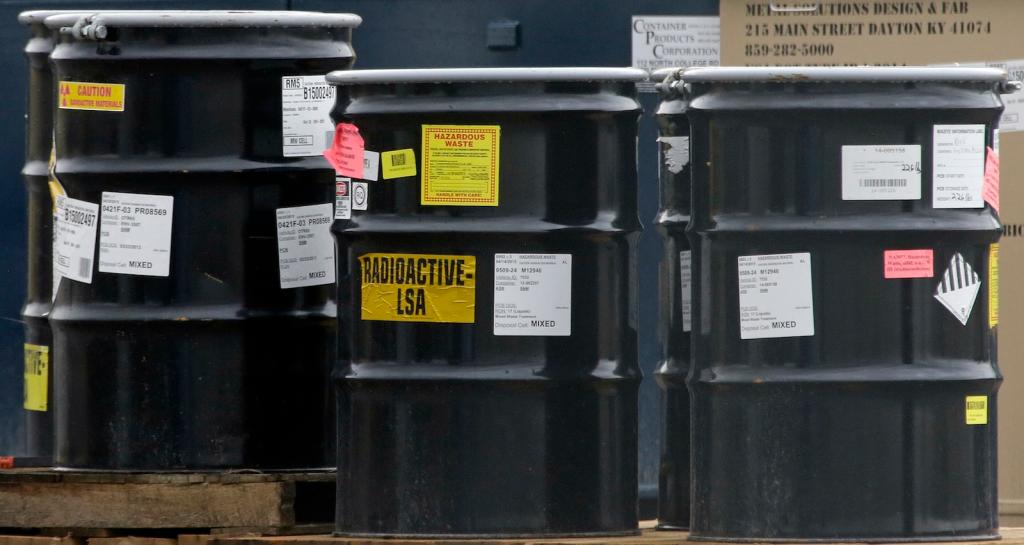 barrels labeled radioactive LSA and hazardous waste