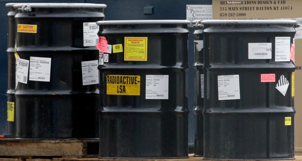 barrels labeled radioactive LSA and hazardous waste