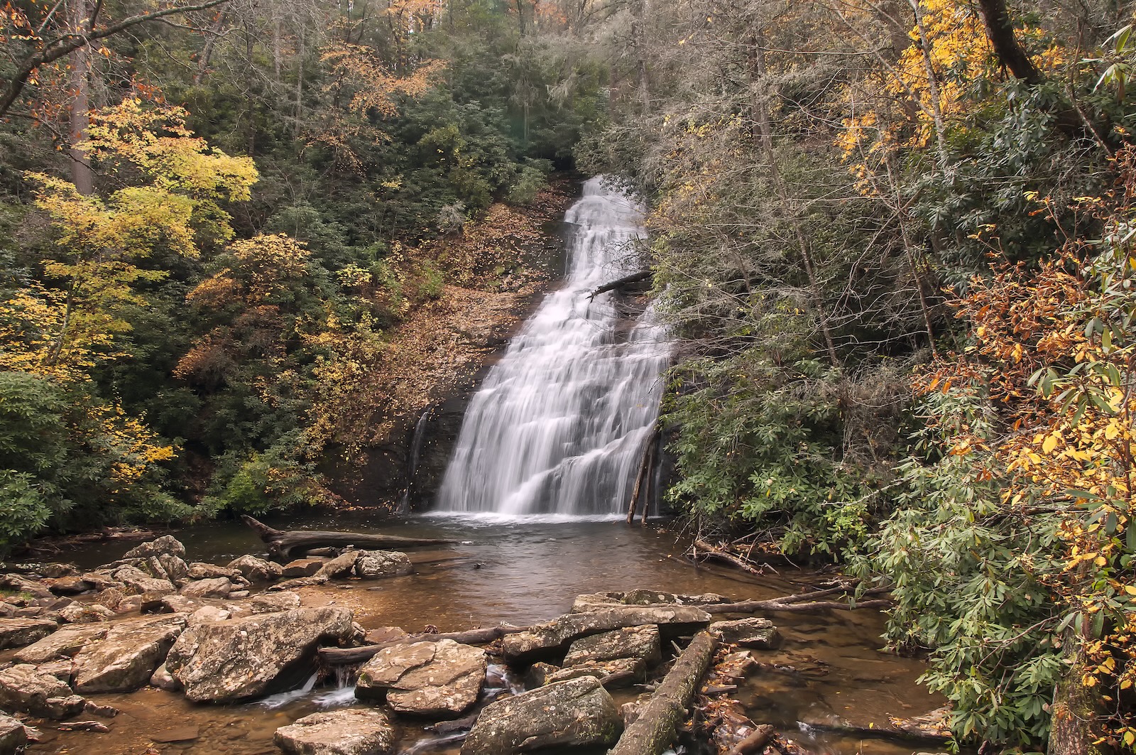 A waterfall in a fall forest in Georgia