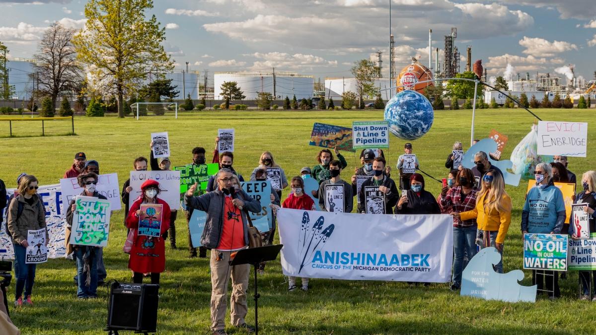 Environmental and Native American activists rally to shut down the Enbridge Line 5 oil pipeline, which runs under the Straits of Mackinac.