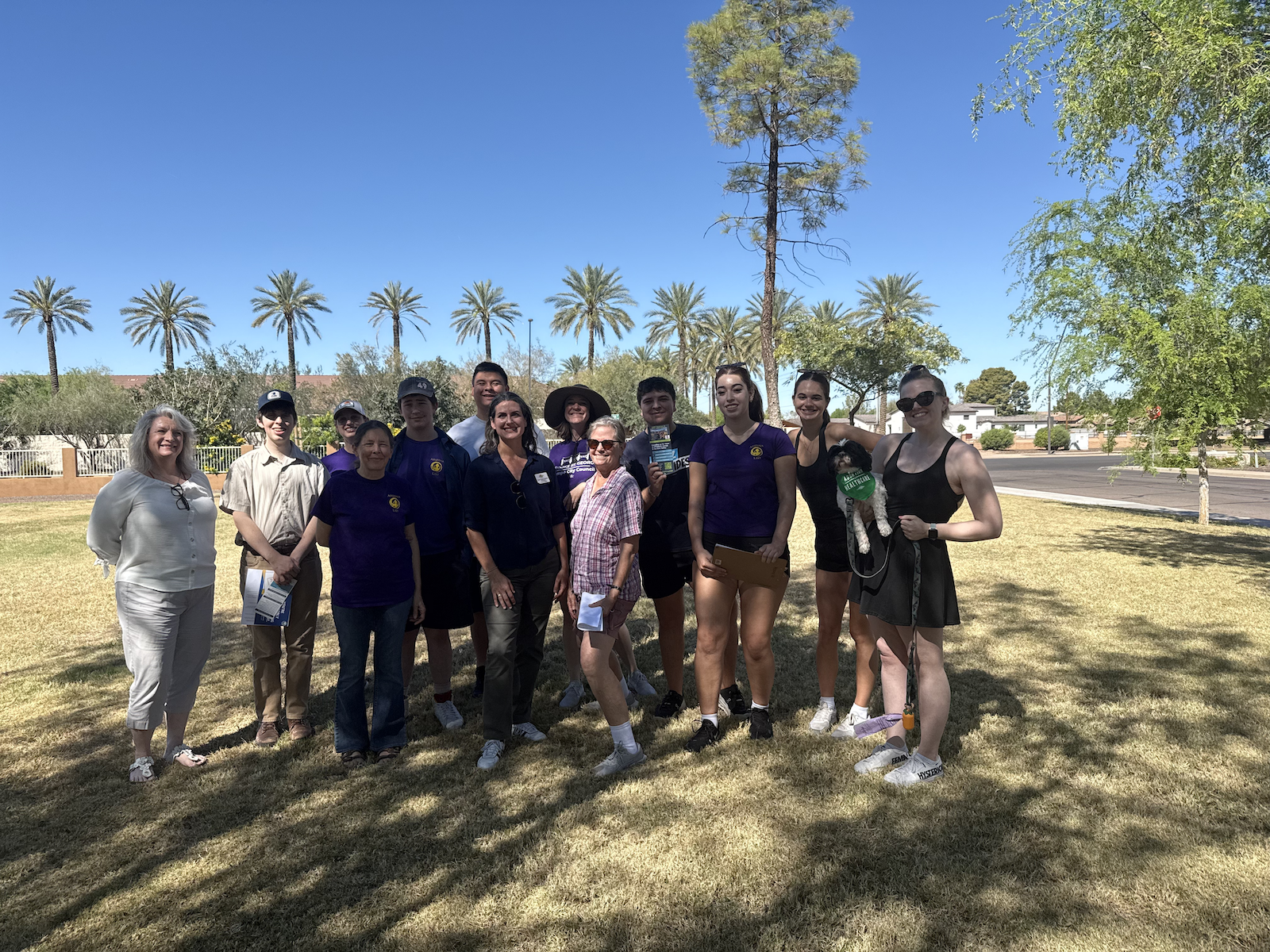 Members of the Salt River Project clean energy slate canvass voters in Tempe in early April. The clean energy slate is advocating for the utility to ditch all new fossil fuel development.