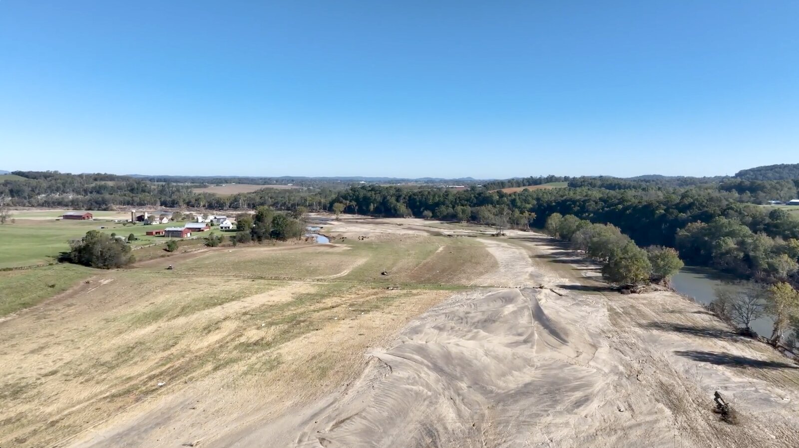 washed up sand from a storm near farmland