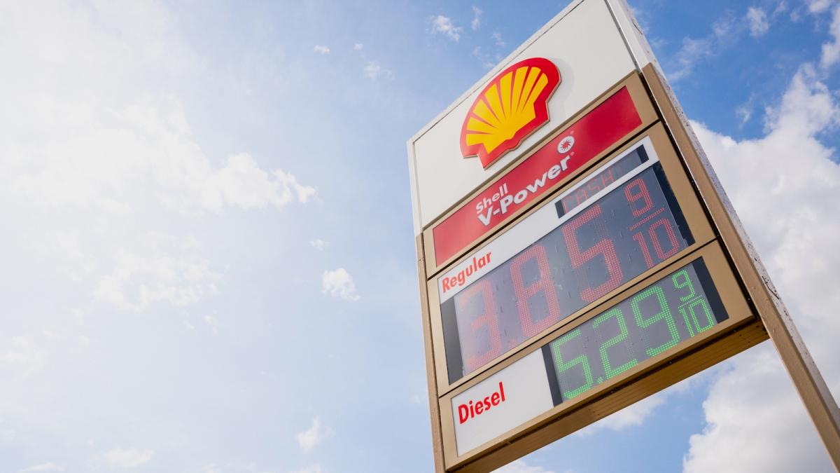 The sign outside a Shell station shows the price of gasoline and diesel fuel.