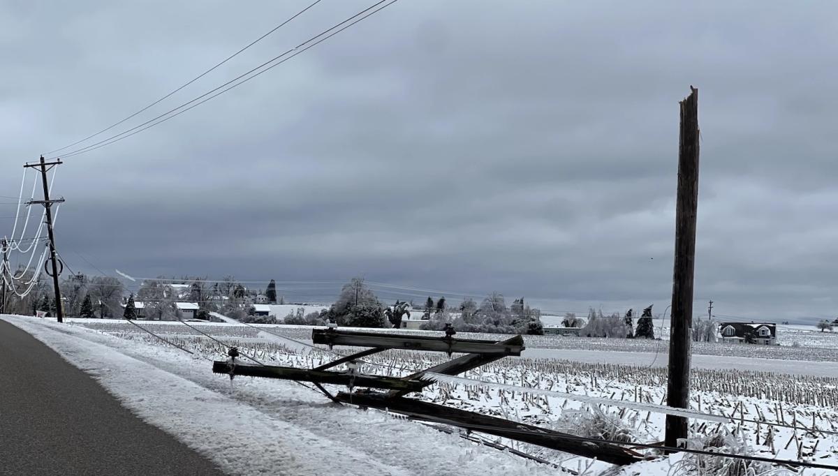 Snapped utility poles and wires from an ice storm