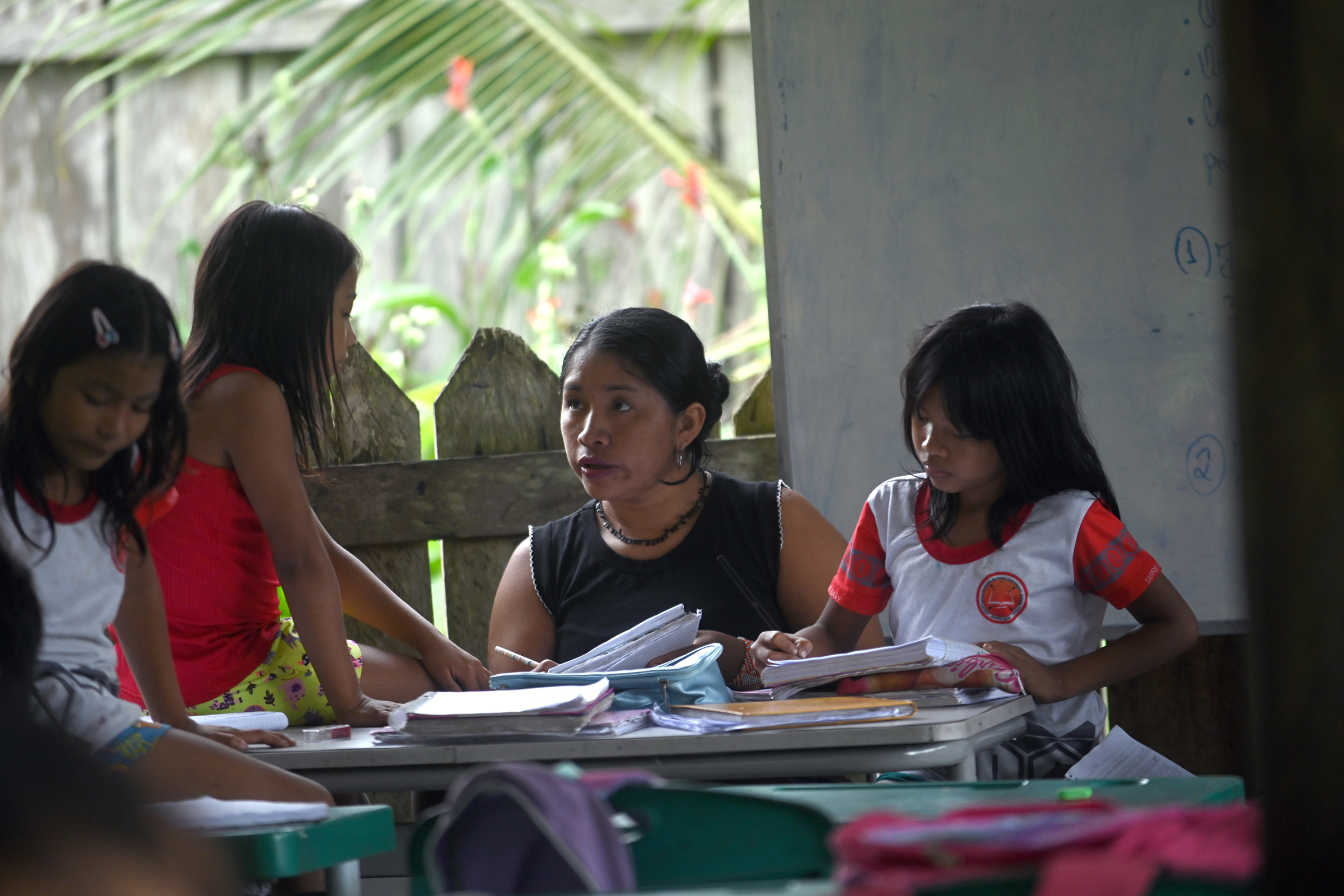 Children sit in a classroom