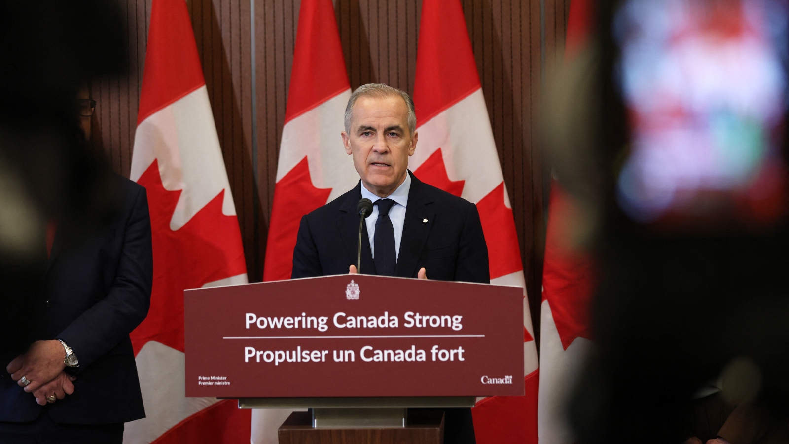 Canadian Prime Minister Mark Carney speaks during a news conference on Parliament Hill in Ottawa, Canada, on May 14, 2026. Carney announced a new initiative to double the size of Canada's power grid.