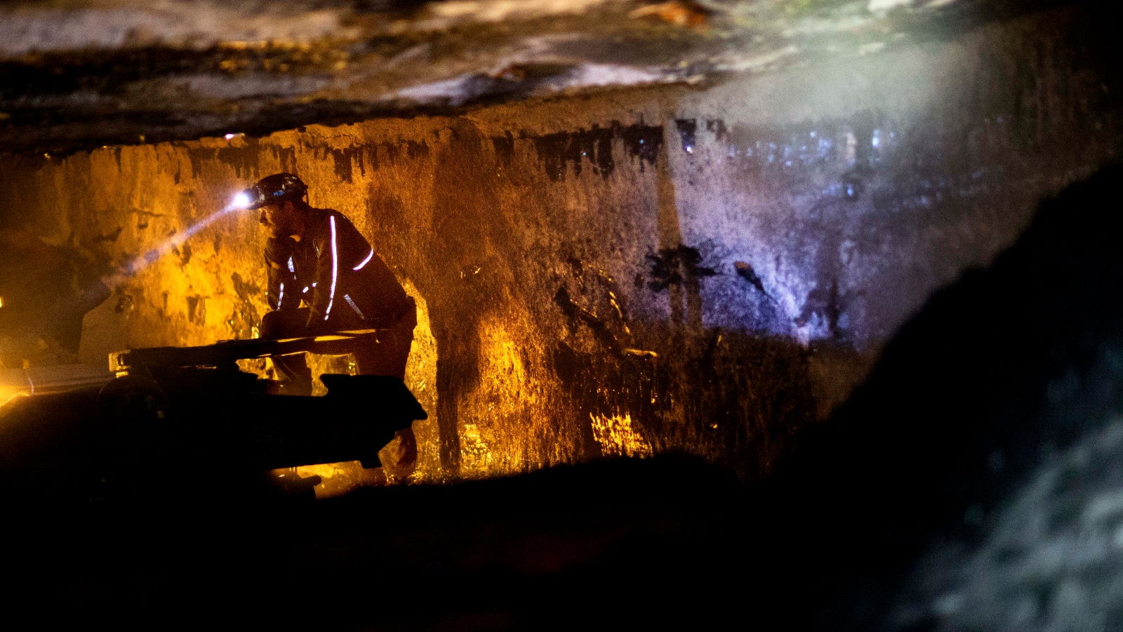 A man in a mine underground