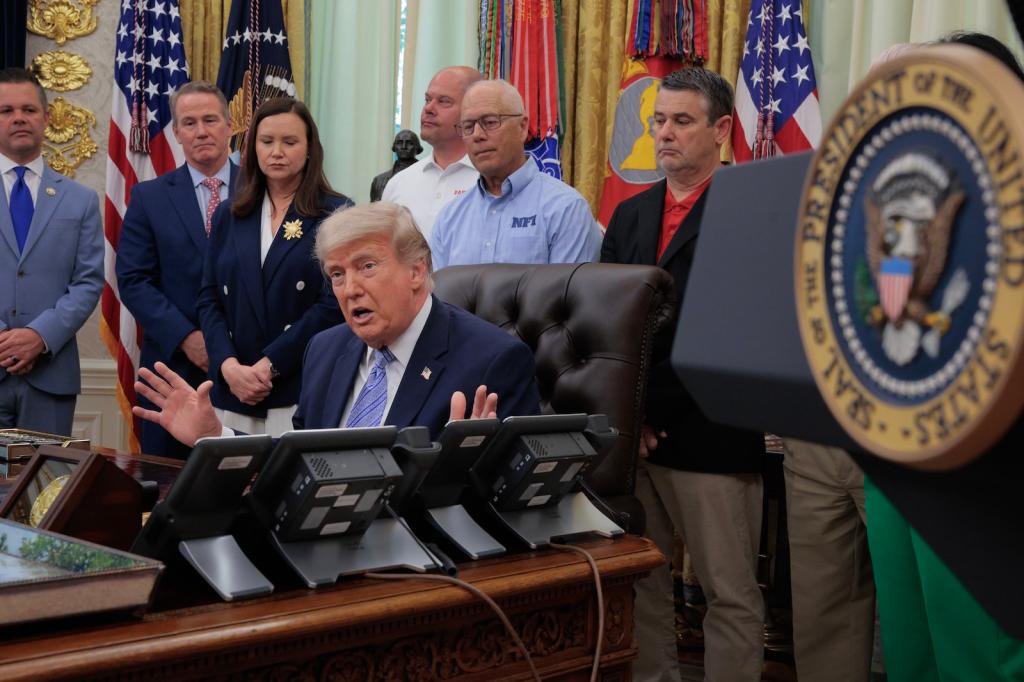 U.S. President Donald Trump is joined by grocery store owners and supermarket in the Oval Office