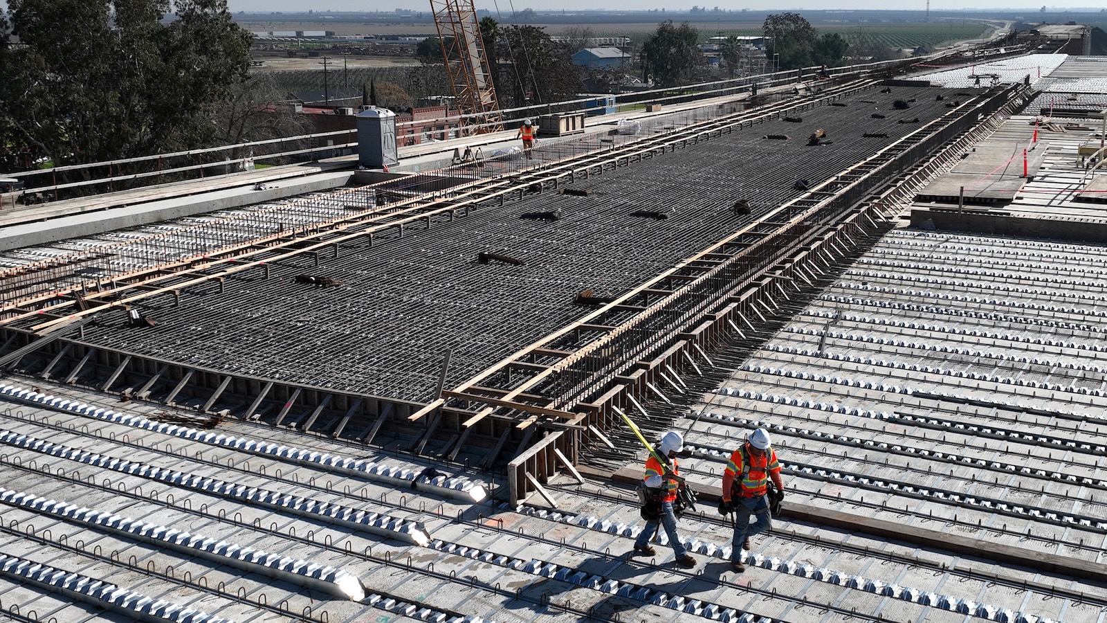 A construction crew works on a viaduct that will be part of the California high speed rail system.