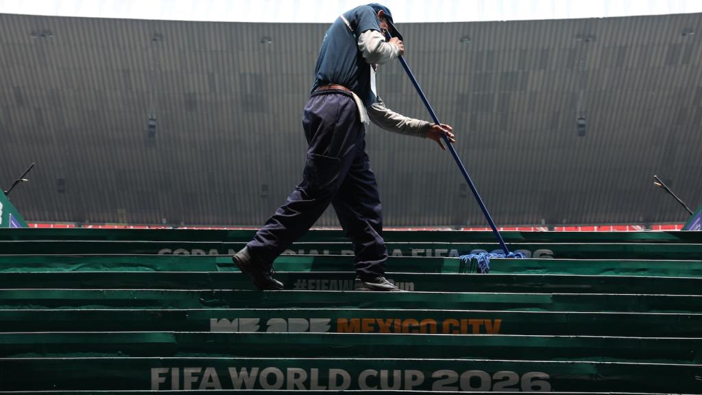 Stadium staff work before the FIFA World Cup 2026 Round of 16 match between Mexico and England at Mexico City Stadium