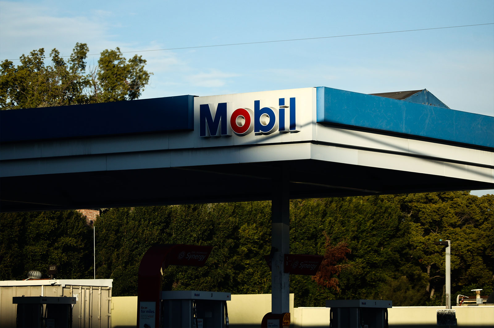 a mobile gas station awning, seen mostly in shadow