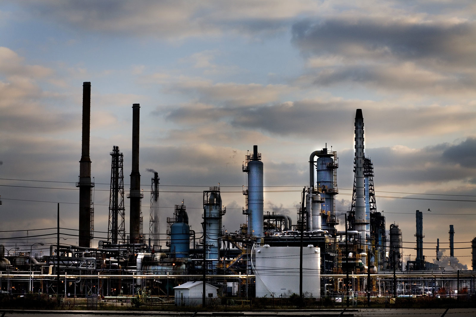 A gas refinery seen at sunset