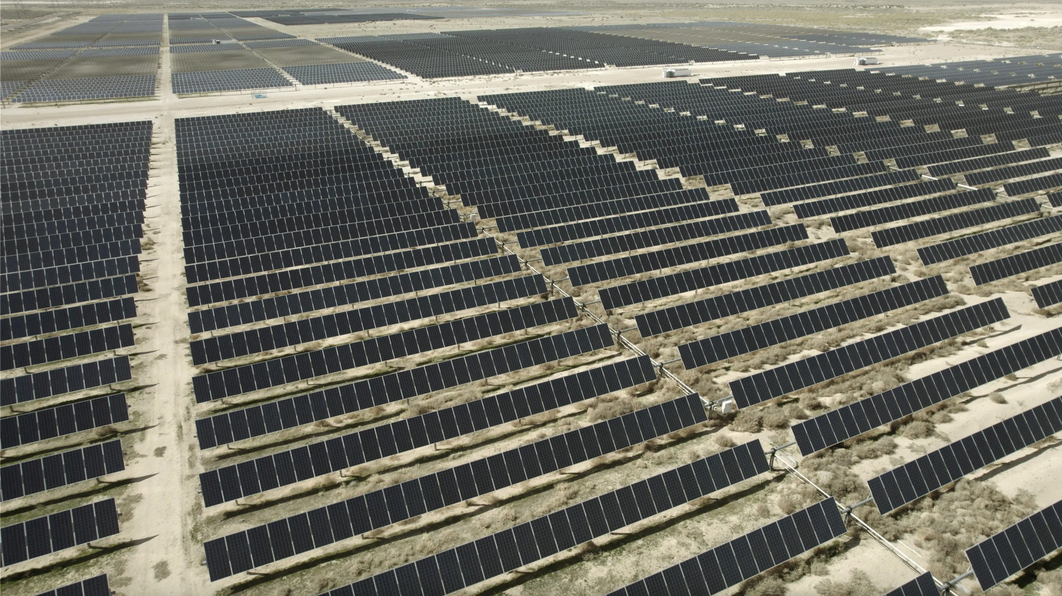 waves of solar panels spread into the distance in Utah