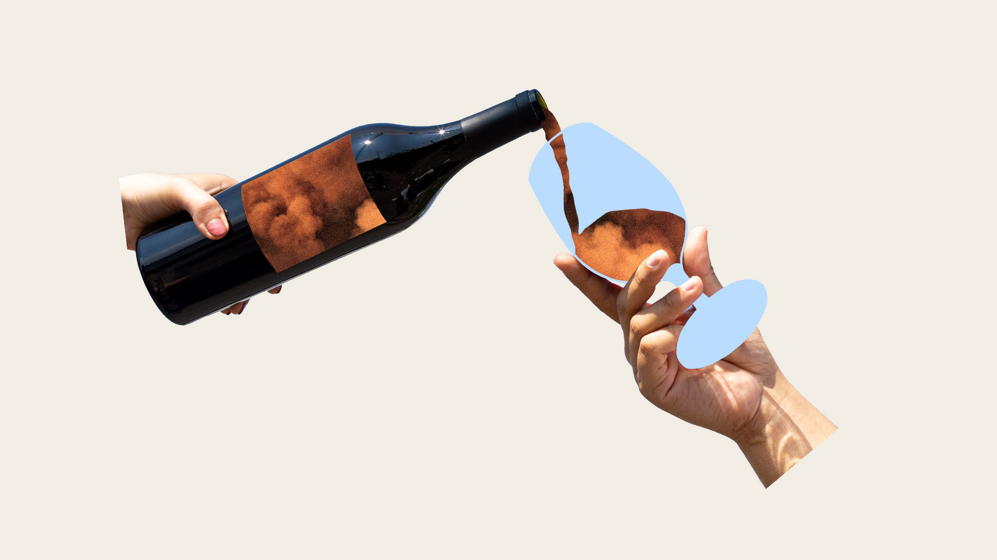 hand holding wine bottle pouring wildfire smoke into wine glass