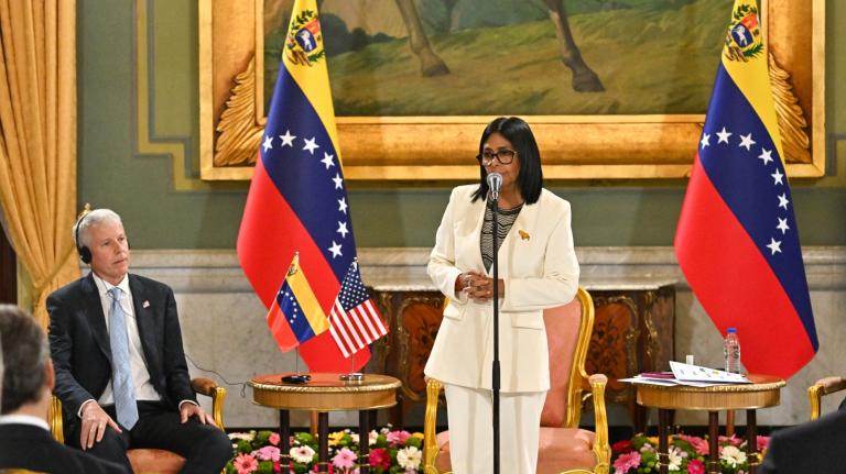 Venezuela's interim President Delcy Rodriguez gives a speech next to Energy Secretary Chris Wright during the signing of an oil agreement at the Miraflores Presidential Palace in Caracas.