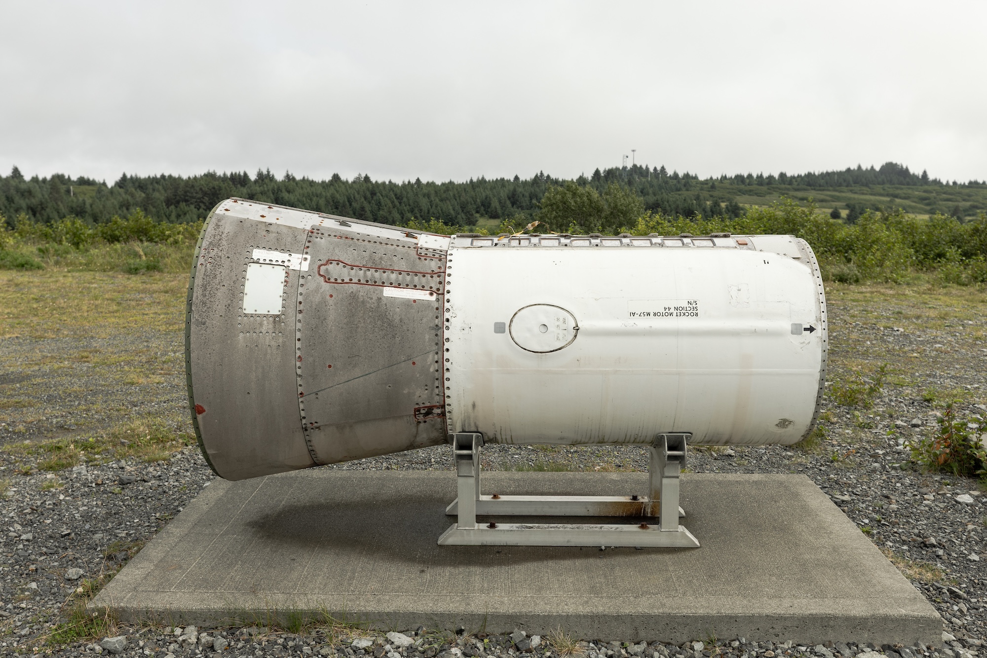 A rocket component mounted as part of an outdoor exhibit