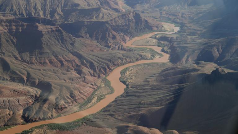 A aerial photo of the grand canyon with flood waters