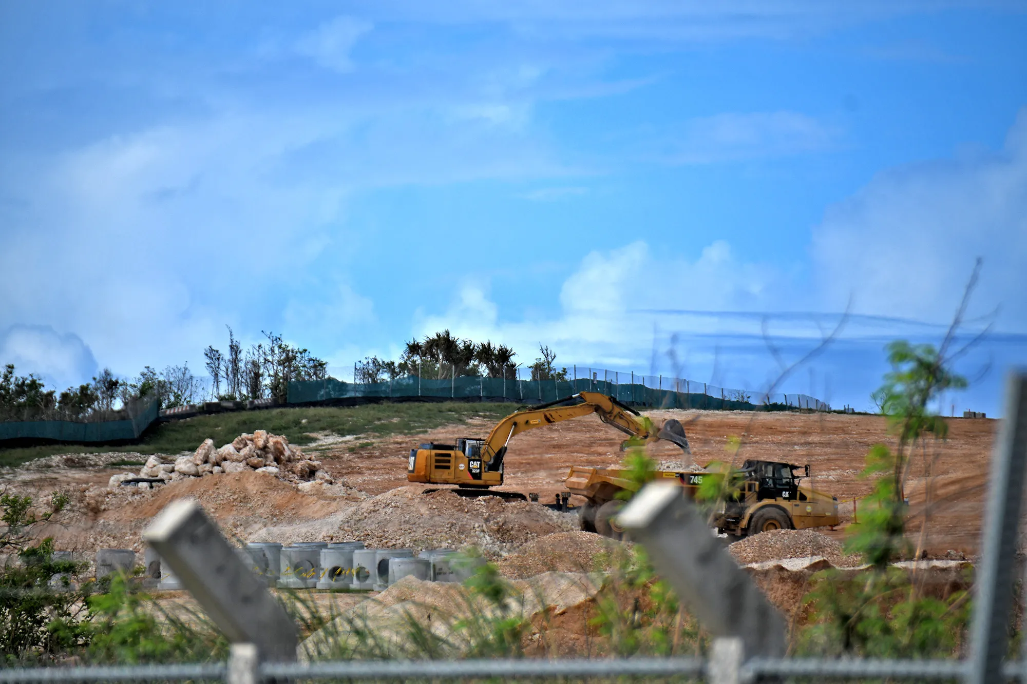 A piece of construction equipment in a large field