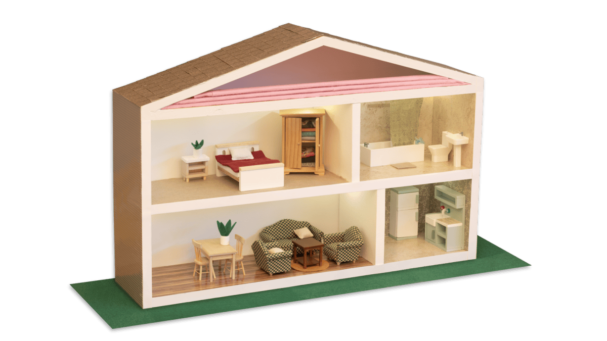 A miniature house made of wood with a cutaway to rooms like a dollhouse. The cutaway shows an attitc with insulation, a bedroom, a kitchen, a living room, and a bathroom. The house sits on a green screen replaced transparent background
